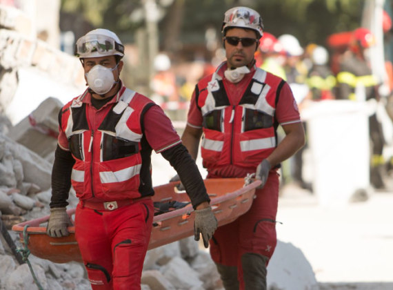 Two men wearing stretcher